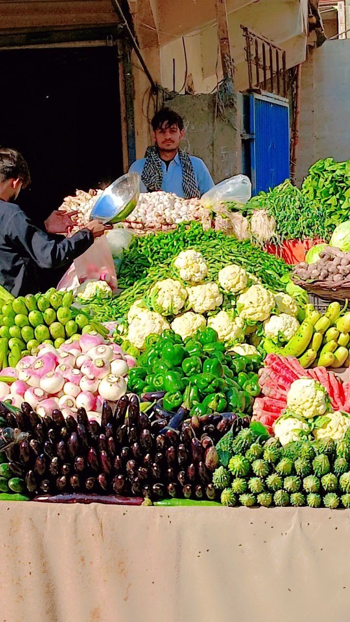 Heaps of cauliflower, capsicum, turnips and aubergine at our stall