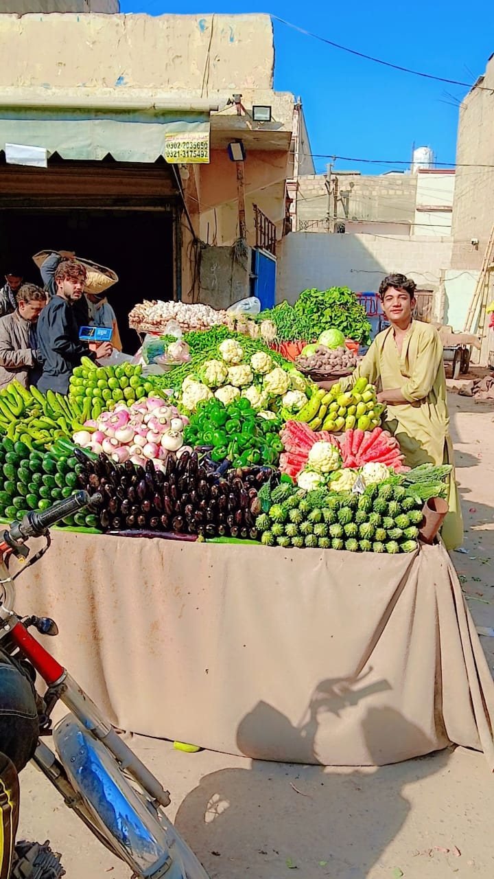 Our shop front with the day's vegetables